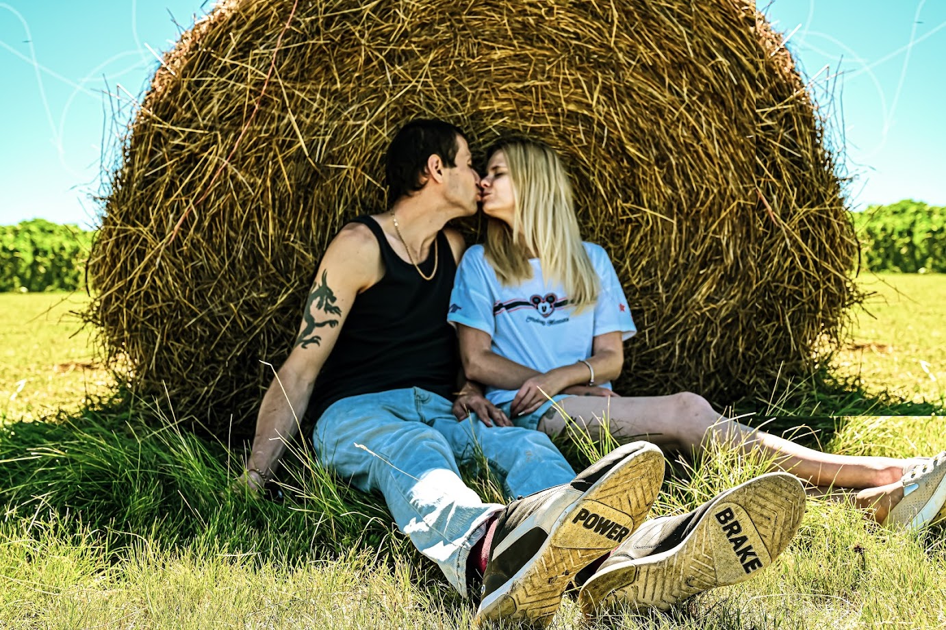 Anna Osmon relaxing on a farm yard